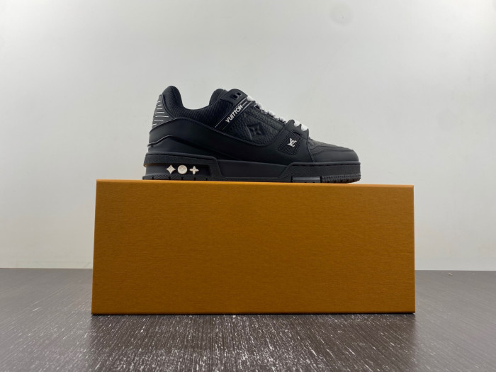 l**is V*t*n trainer all black embossing