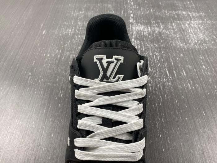 l**is V*t*n trainer all black embossing