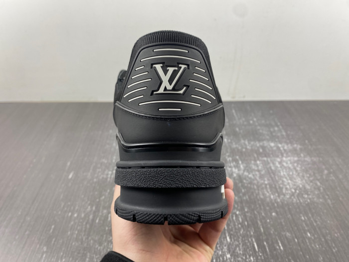 l**is V*t*n trainer all black embossing